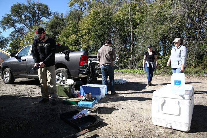 Karrie Weber with students conducting fieldwork